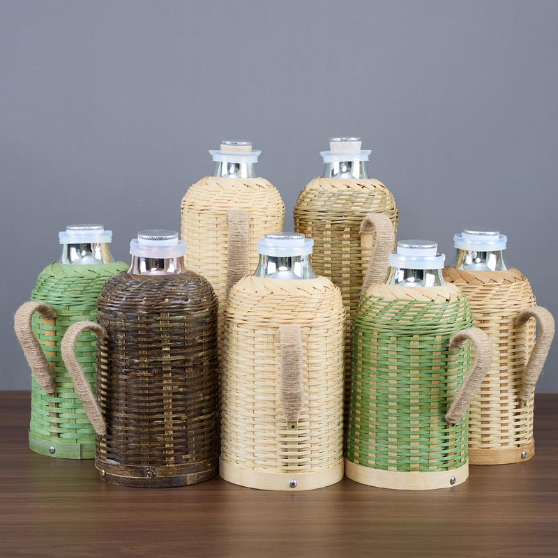 Bamboo-woven vacuum flasks in natural, green and purple bamboo